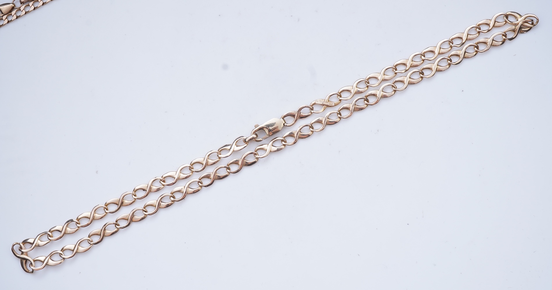 Three gold necklaces